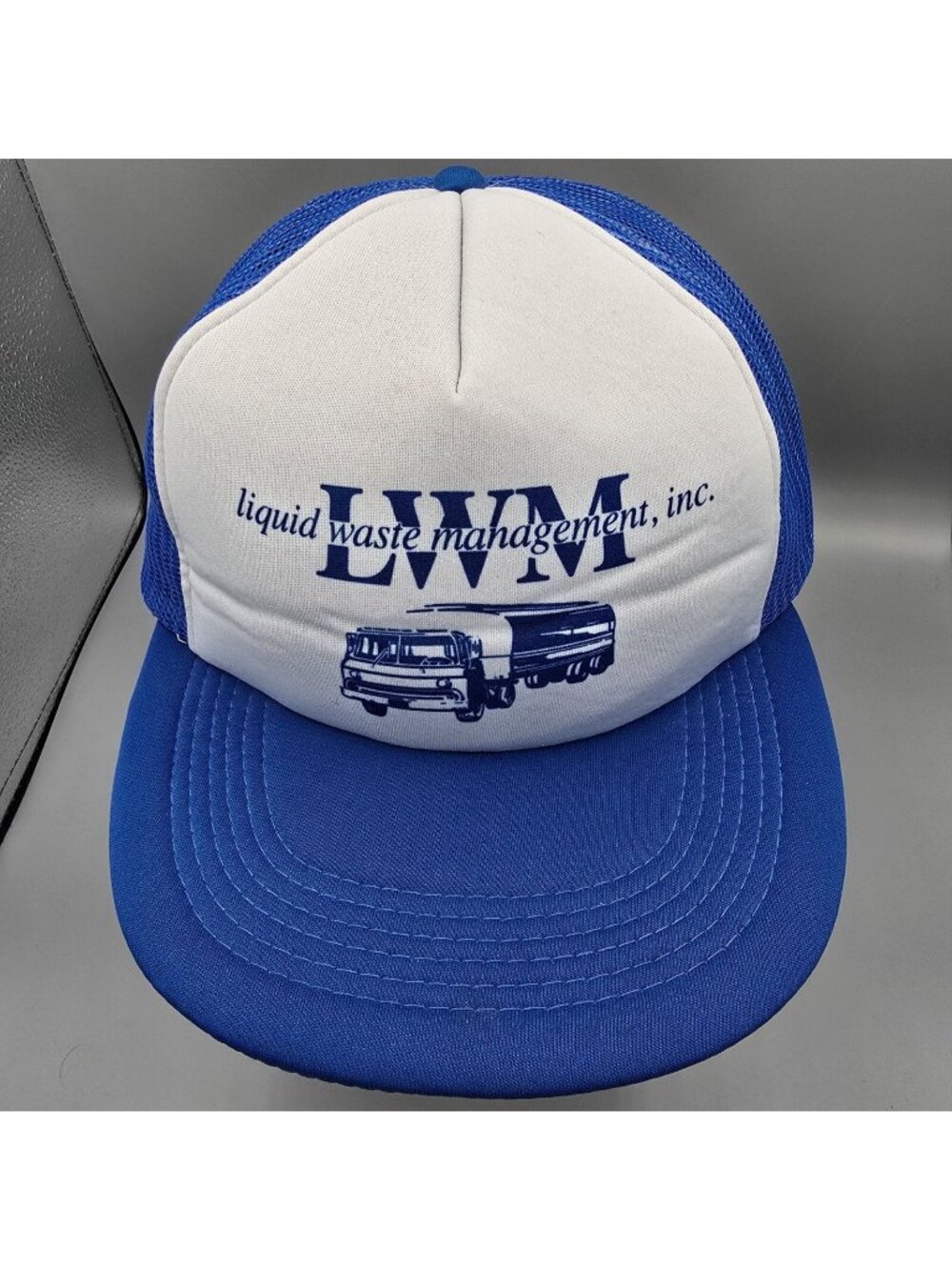Distressed LWM Liquid Waste Management, Inc. Fort Lupton Colorado Trucker Hat